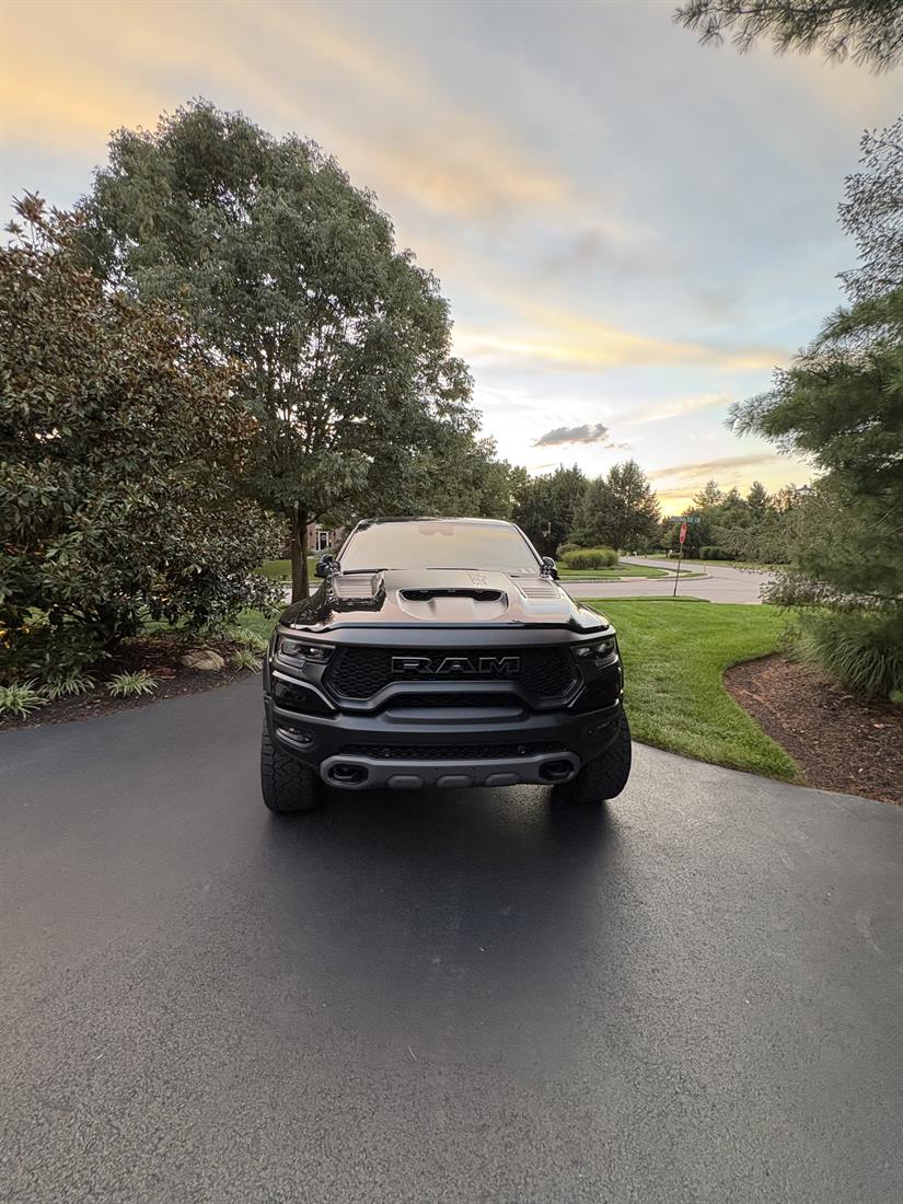 Black Ram TRX detailed in a driveway at golden hour