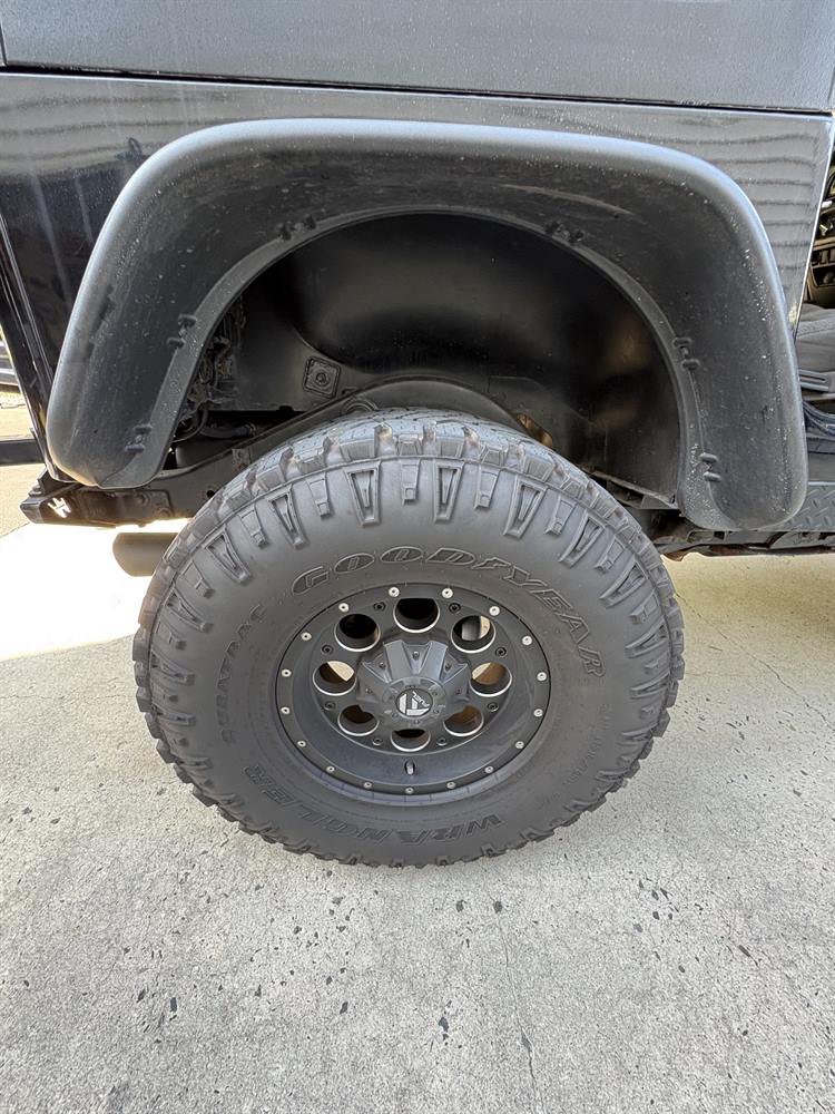 A clean wheel and tire after a full exterior detail